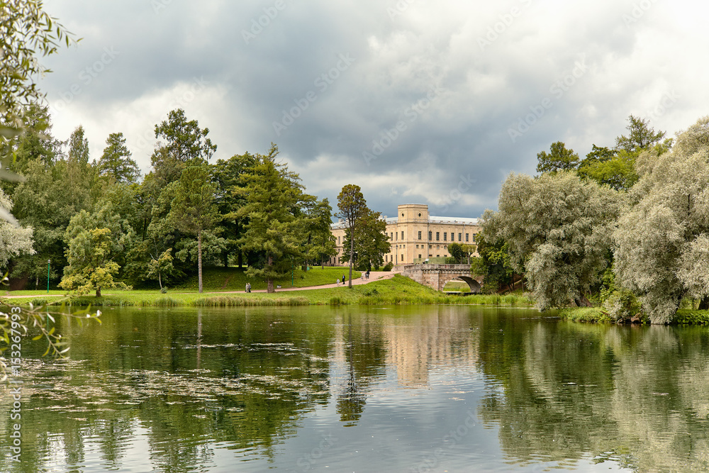 View of the Gatchina Palace from the side of the Palace Park, next to Karpin pond in autumn. St.Petersburg