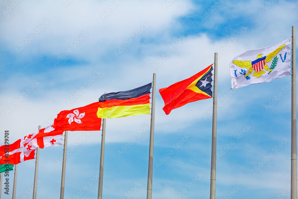Flags of countries. different countries on the flagpole Flags of countries. different countries on the flagpole