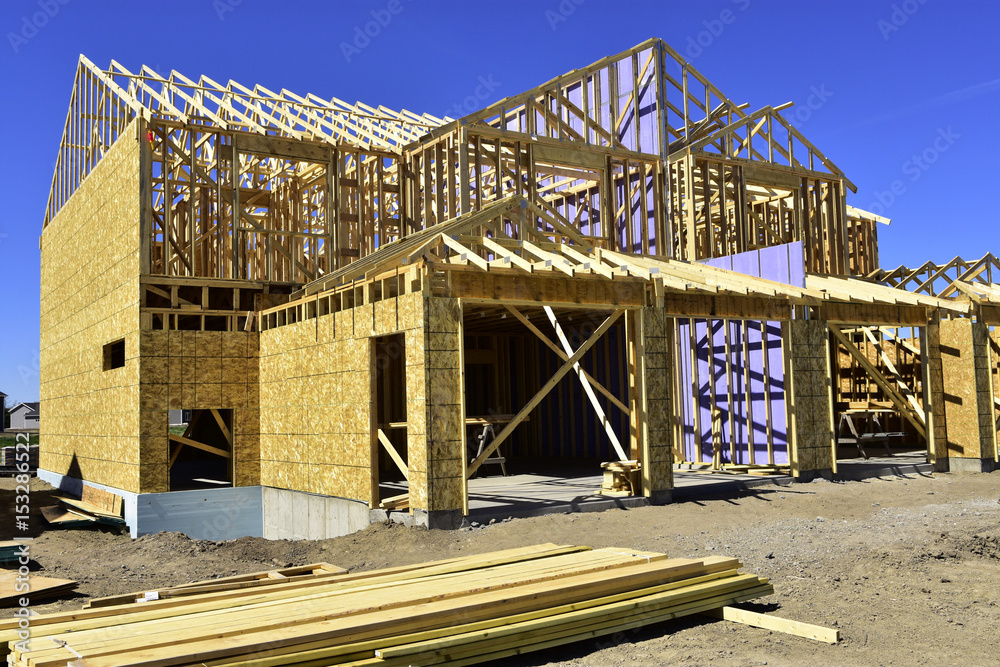 Obraz premium Residential wood frame home under construction.