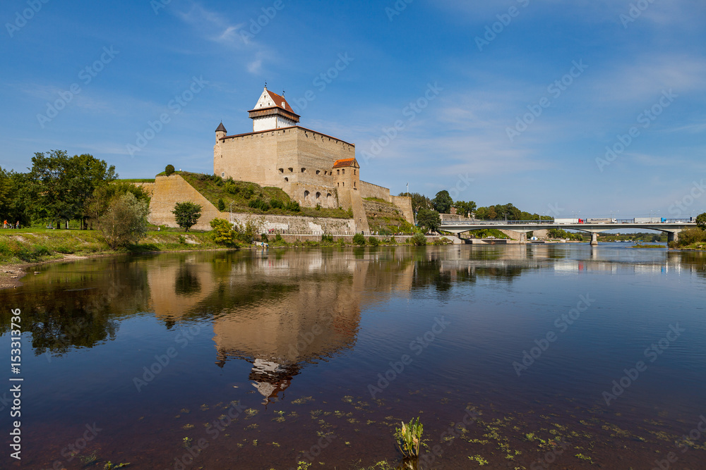 Medieval fortress on the river Narva, Estonia and Russia border. Summer day view.