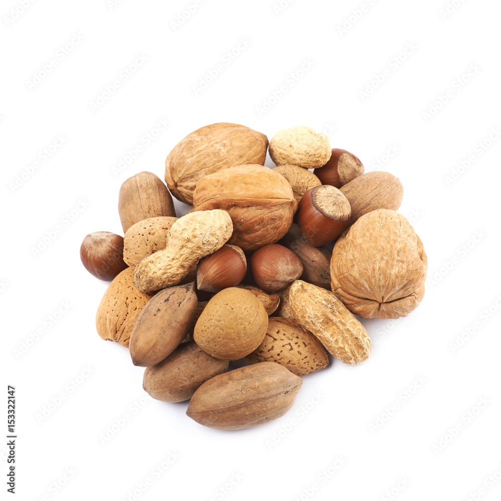 Pile of multiple kind of nuts isolated Pile of multiple kind of nuts isolated