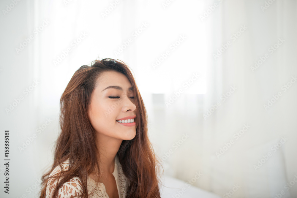 Woman Relaxing in bed and relaxing in her living room Woman Relaxing in bed and relaxing in her living room