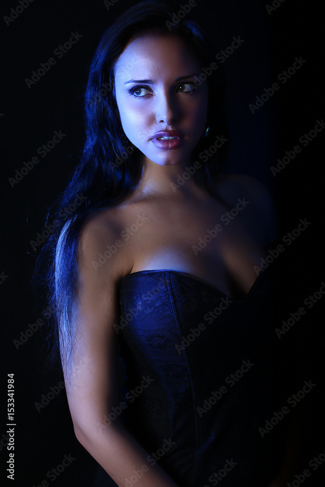 Fototapeta premium Book cover for a vampire novel - beautiful brunette wearing a black dress