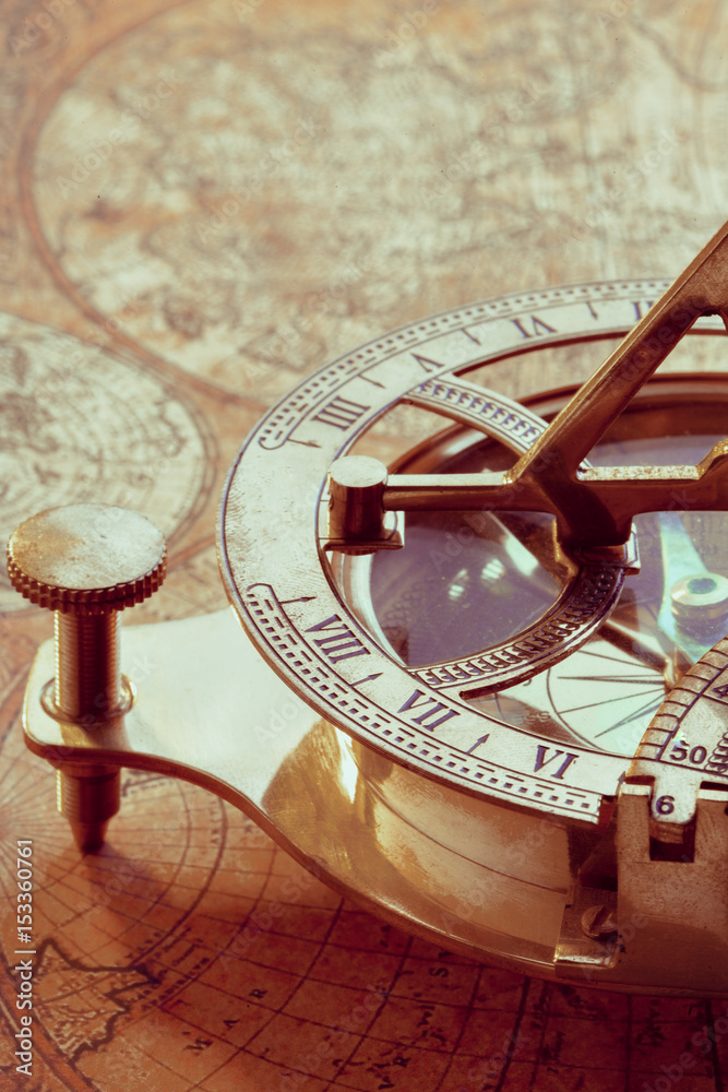 Old compass over ancient map Old compass over ancient map