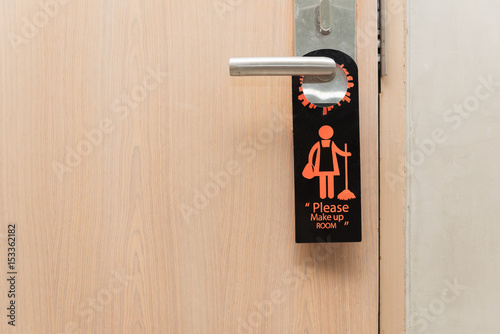 Please make up room sign on door knob