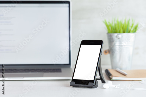 phone mobile showing white blank screen on work desk