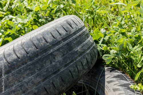 Old damaged tire are on the road.