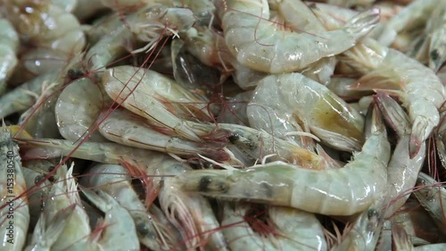 Fresh raw green shrimp  on ice are sale in the local market close up
