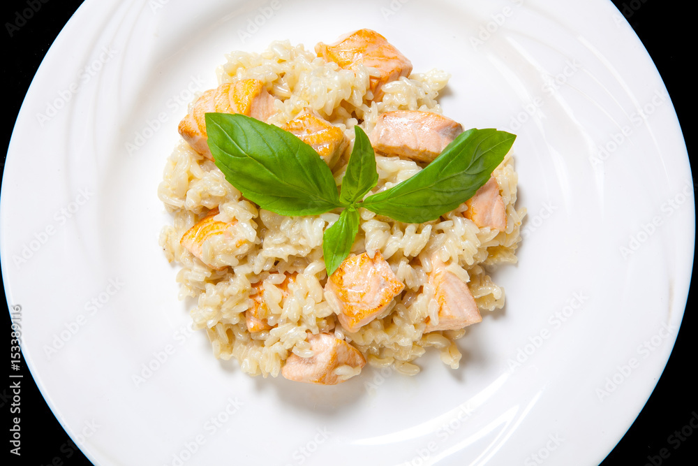 Risotto with salmon in a mild creamy sauce Risotto with salmon in a mild creamy sauce