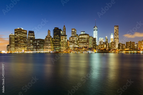 Panorama of Brooklyn Bridge and Lower Manhattan by night