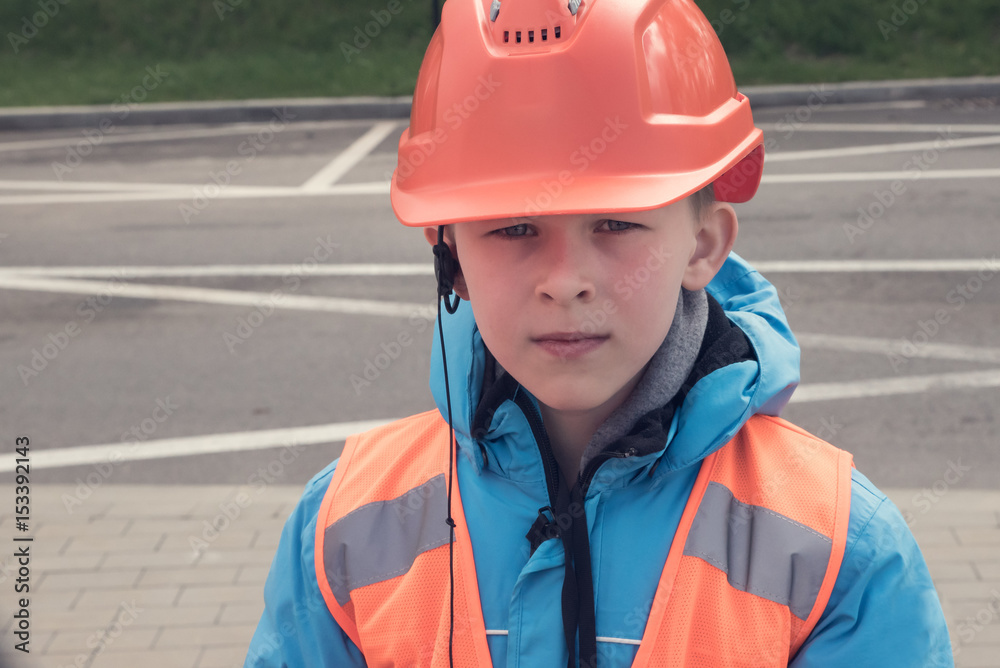 A boy in helmet