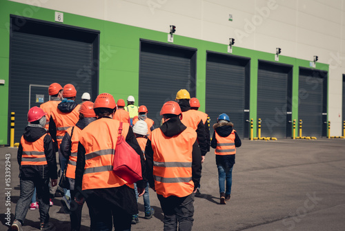Group of people visiting work place