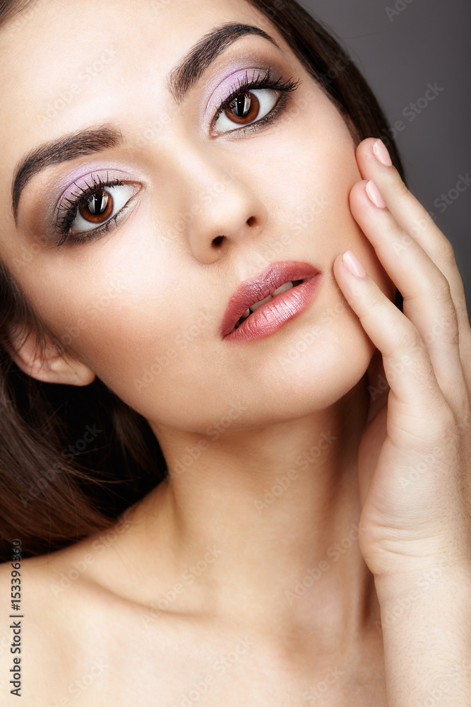 Portrait of beautiful big-eyed young brunette woman Portrait of beautiful big-eyed young brunette woman