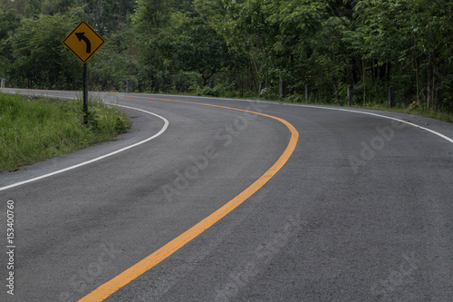 Asphalt road curve transportation.