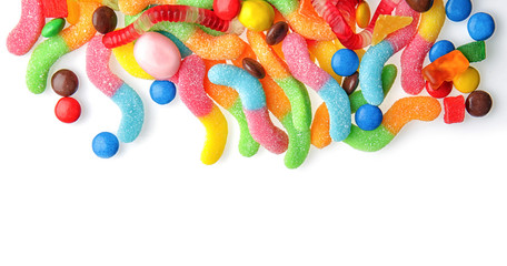 Colorful candies on white background