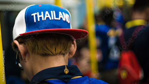 Wearing a hat with Thailand on it in Bangkok Subway