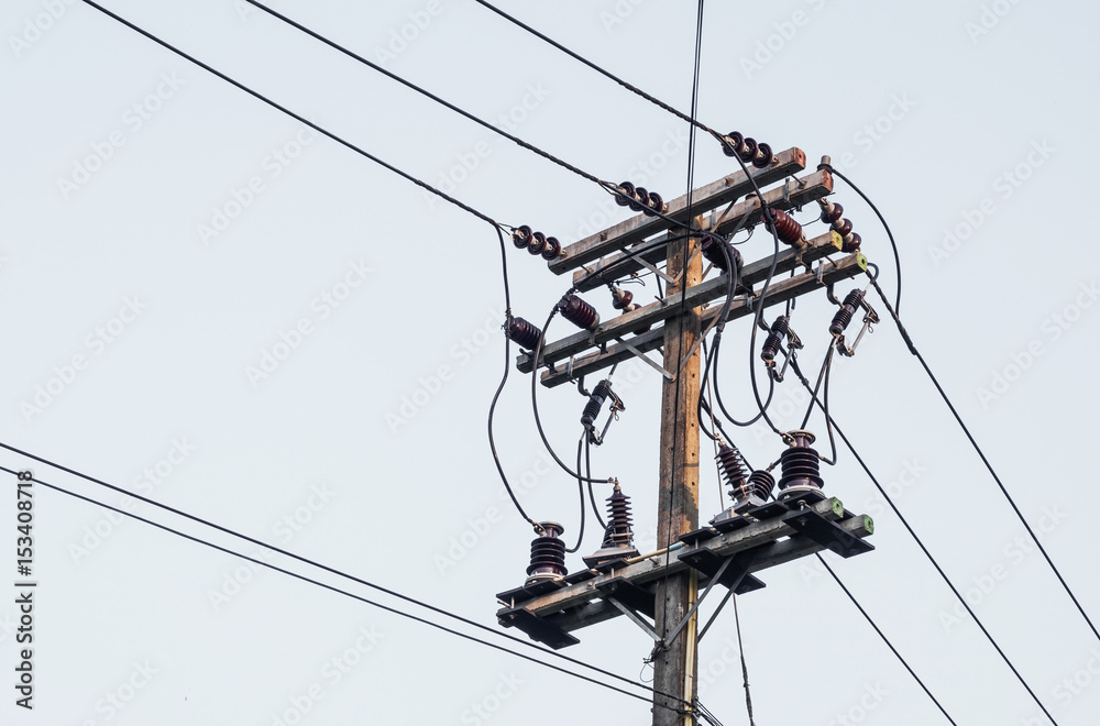 Electricity pylons carry power lines and cable lines