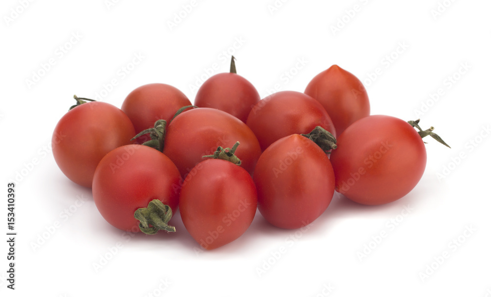 Cherry tomatoes and a basil branch on a white background Cherry tomatoes and a basil branch on a white background
