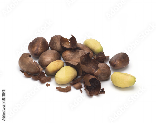 Loquat, peeled seeds on a white background