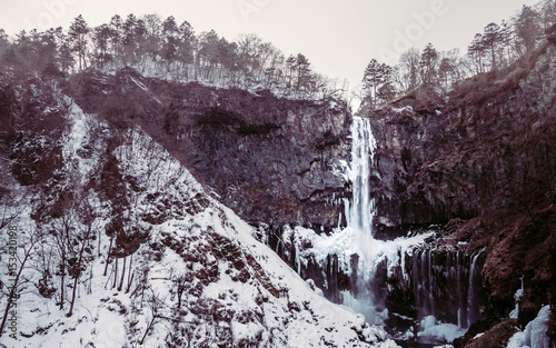 The almost 100 meters tall Kegon Waterfall, Kegon no taki is the most famous of Nikko's many beautiful waterfalls. In fact, it is even ranked as one of Japan's three most beautiful waterfalls. Frozen  photo