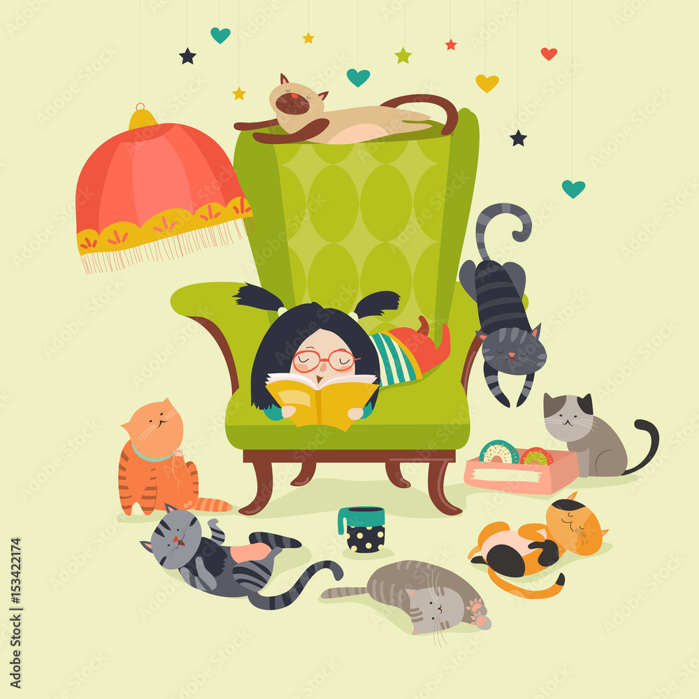 Fototapeta premium Girl reading book to cats