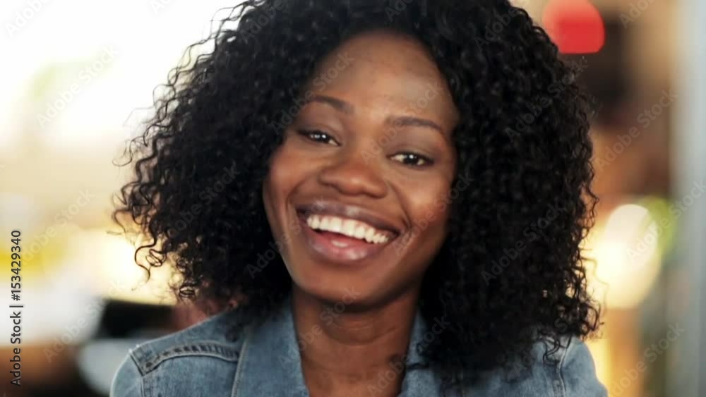 face of happy smiling afro american woman face of happy smiling afro american woman