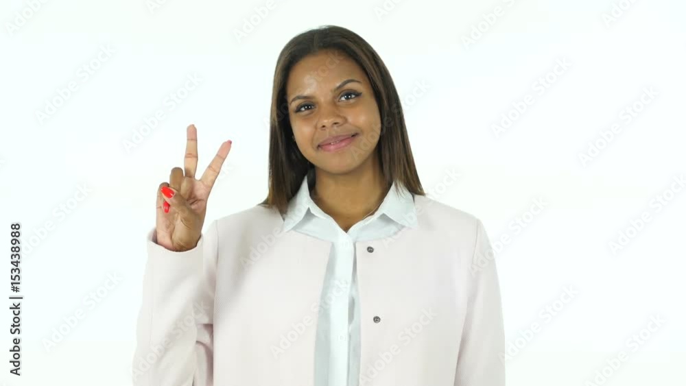 Victory Sign by Afro-American Beautiful Woman, White Background Victory Sign by Afro-American Beautiful Woman, White Background