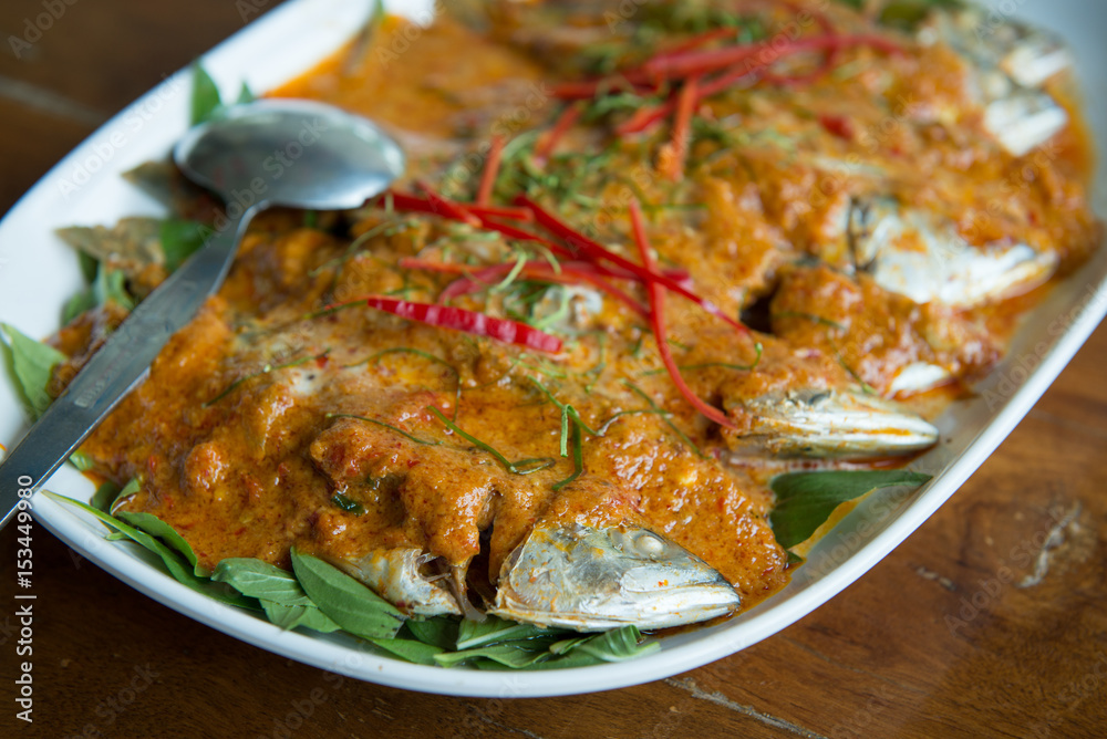 mackerel topped with chili sauce and coconut milk mackerel topped with chili sauce and coconut milk