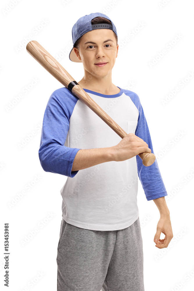 Teen baseball player with a bat looking at the camera Teen baseball player with a bat looking at the camera