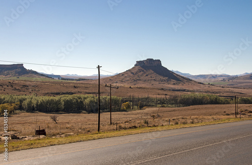 Asphalt Road Running Through Dry Winter Landscape in South Africa