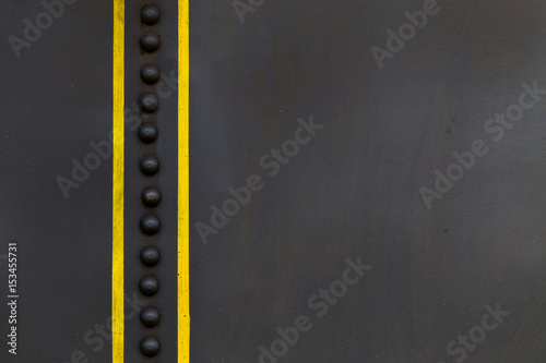 metal background with yellow bars