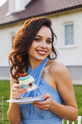 cute bridesmaid eats wedding cake © BY-_-BY