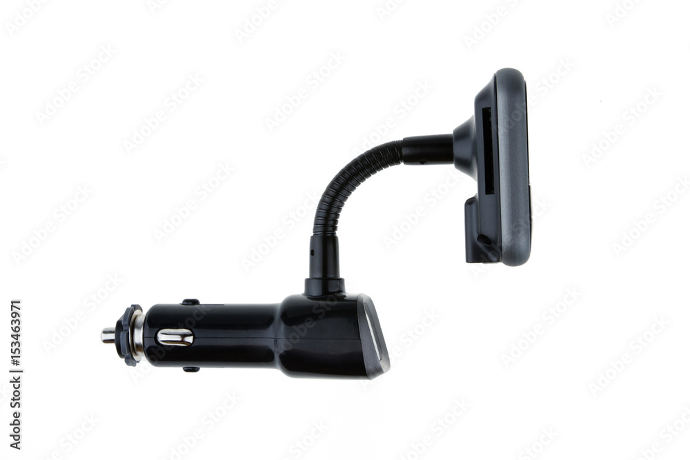 Mp3 Fm transmitter with remote control isolated on white background. It plays mp3, you listen on fm channel on car radio Mp3 Fm transmitter with remote control isolated on white background. It plays mp3, you listen on fm channel on car radio