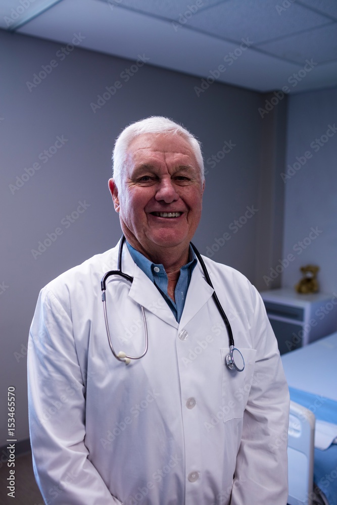 Portrait of male doctor standing in ward Portrait of male doctor standing in ward