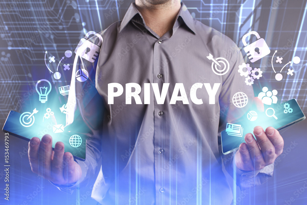 Business, Technology, Internet and network concept. Young businessman working on a virtual screen of the future and sees the inscription: Privacy