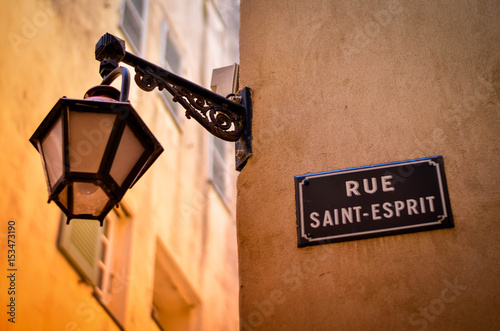 street light hanging on french narrow