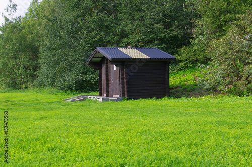 Norway summer landscape. Green bright grass.