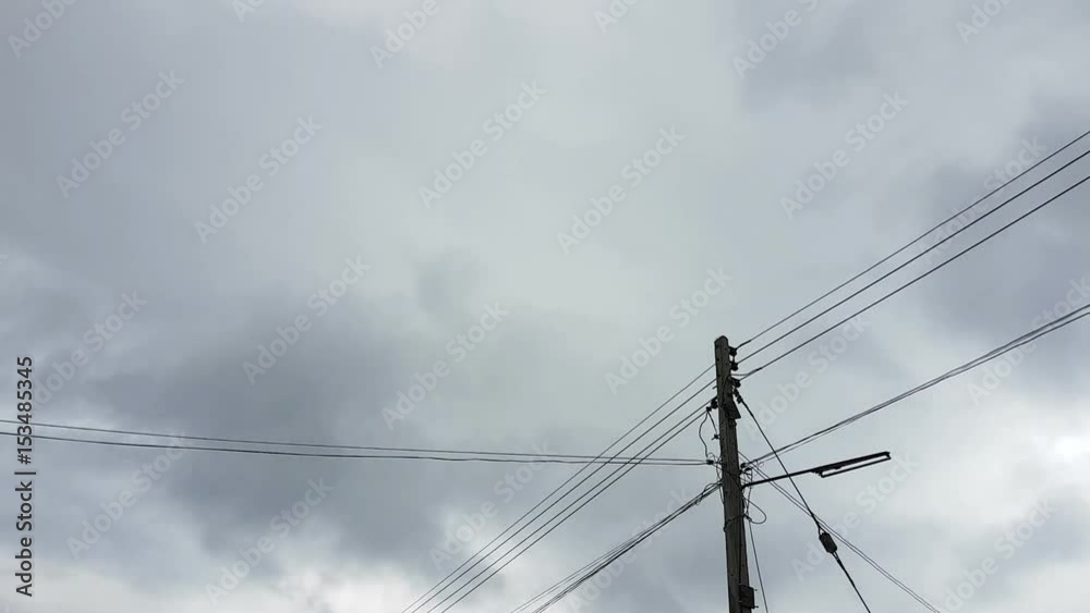 time lapse clouds with electric pole standing time lapse clouds with electric pole standing