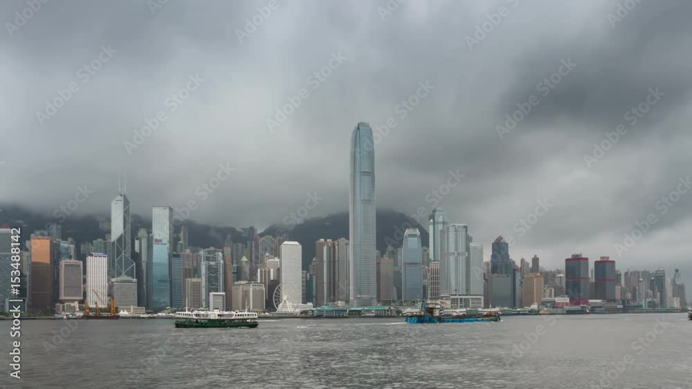 HONG KONG - MAY 2017:Hong Kong Island City view of Kowloon, in Victoria Harbour during the rainy season . HONG KONG - MAY 2017:Hong Kong Island City view of Kowloon, in Victoria Harbour during the rainy season .