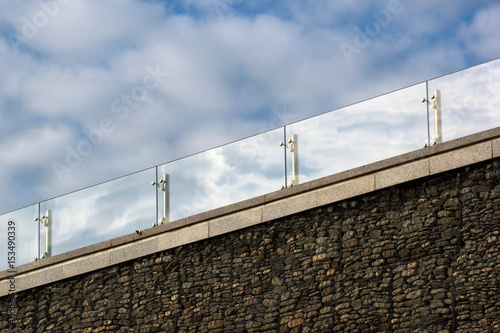 Glass handrails on a roof photo