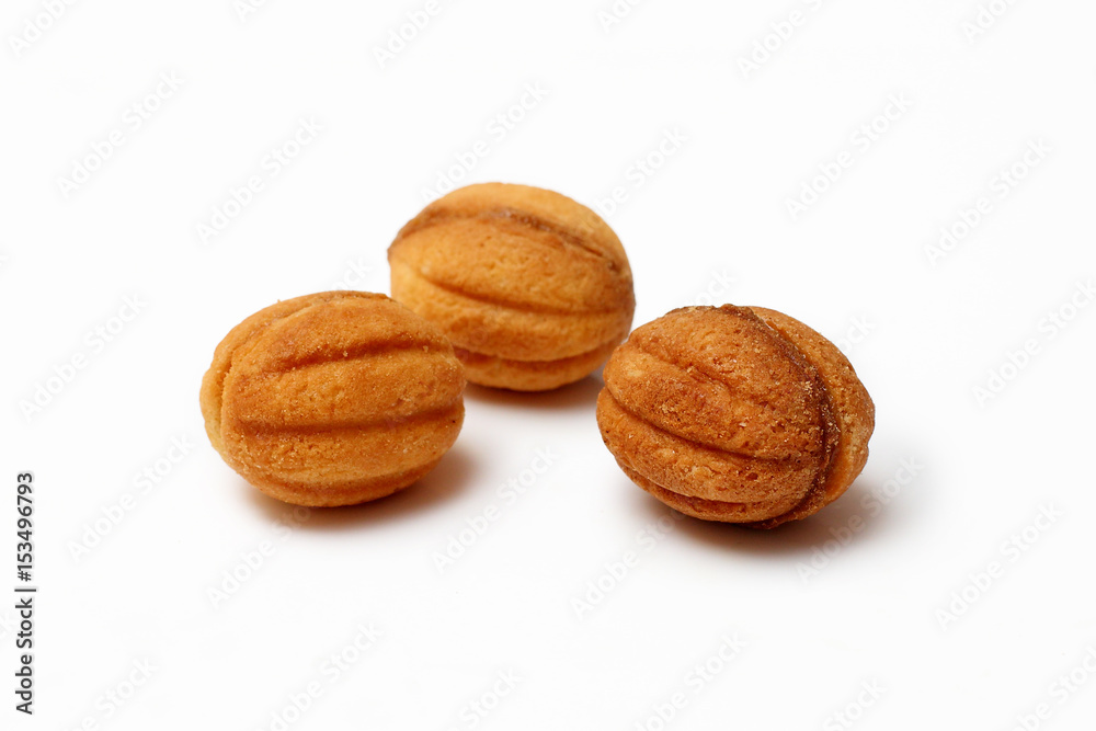 homemade cookies, nuts with condensed milk on white background homemade cookies, nuts with condensed milk on white background