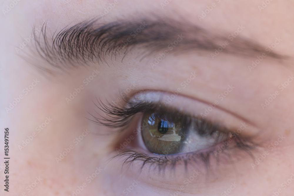 Fototapeta premium Eye of a young girl .