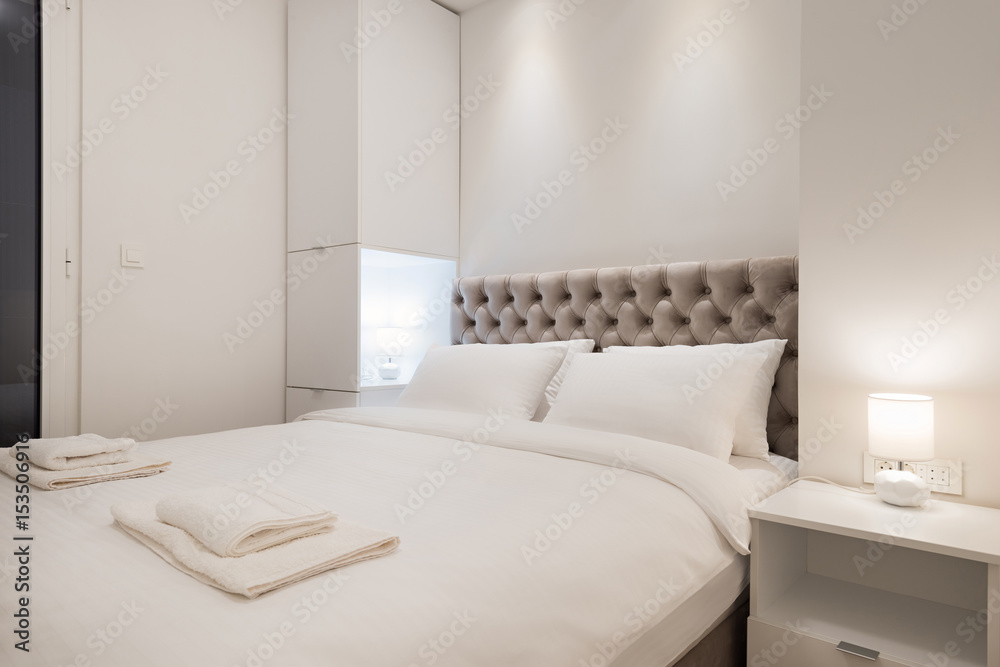 Fototapeta premium Double bed bedroom interior
