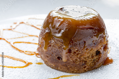 Sticky Toffee Pudding Close Up With Caramel Sauce