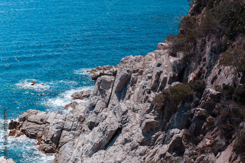 The Summer Blue sea with the rock