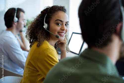 Customer service executive working at office photo