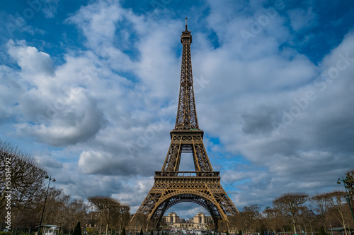 Fototapeta Naklejka Na Ścianę i Meble -  Clouds, Blue Sky And The Eiffel Tower