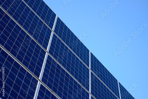 Solar panels on a clean blue sky © Maxim