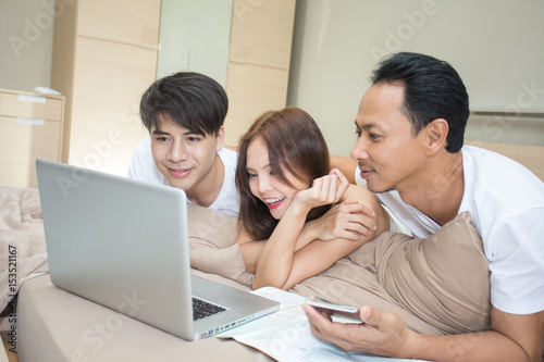 Group of man and woman using computer in the room. lifestyle people concept.