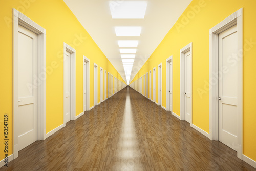 an endless corridor with lots of white doors photo